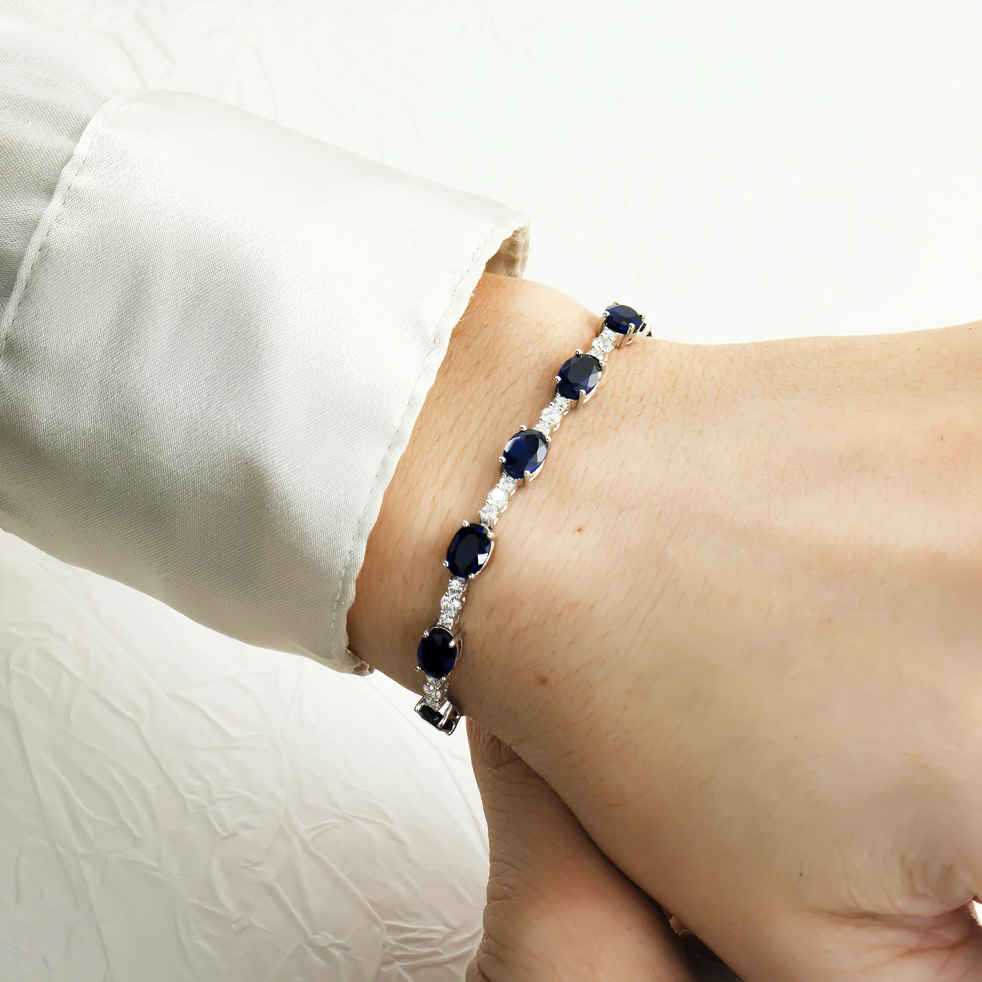 White Gold Oval Cut Sapphire & Round Cut Diamond Bracelet - Image 2
