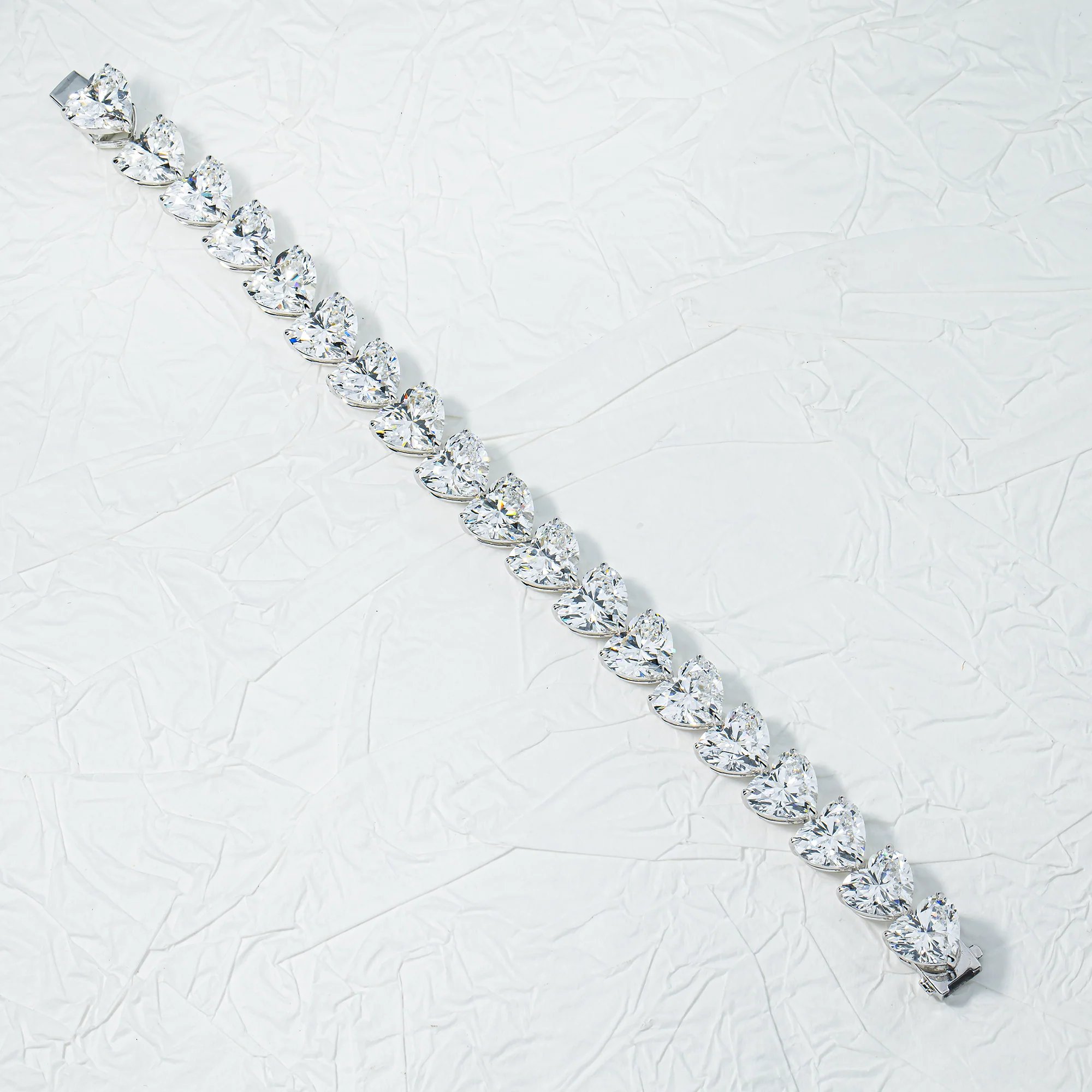 IGI 18K White Gold Heart Cut Diamond Tennis Bracelet 58.13ct - Image 3